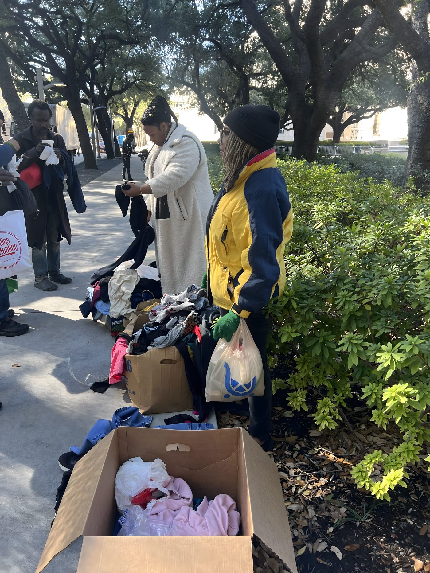 Sorting and handing out clothing donations
