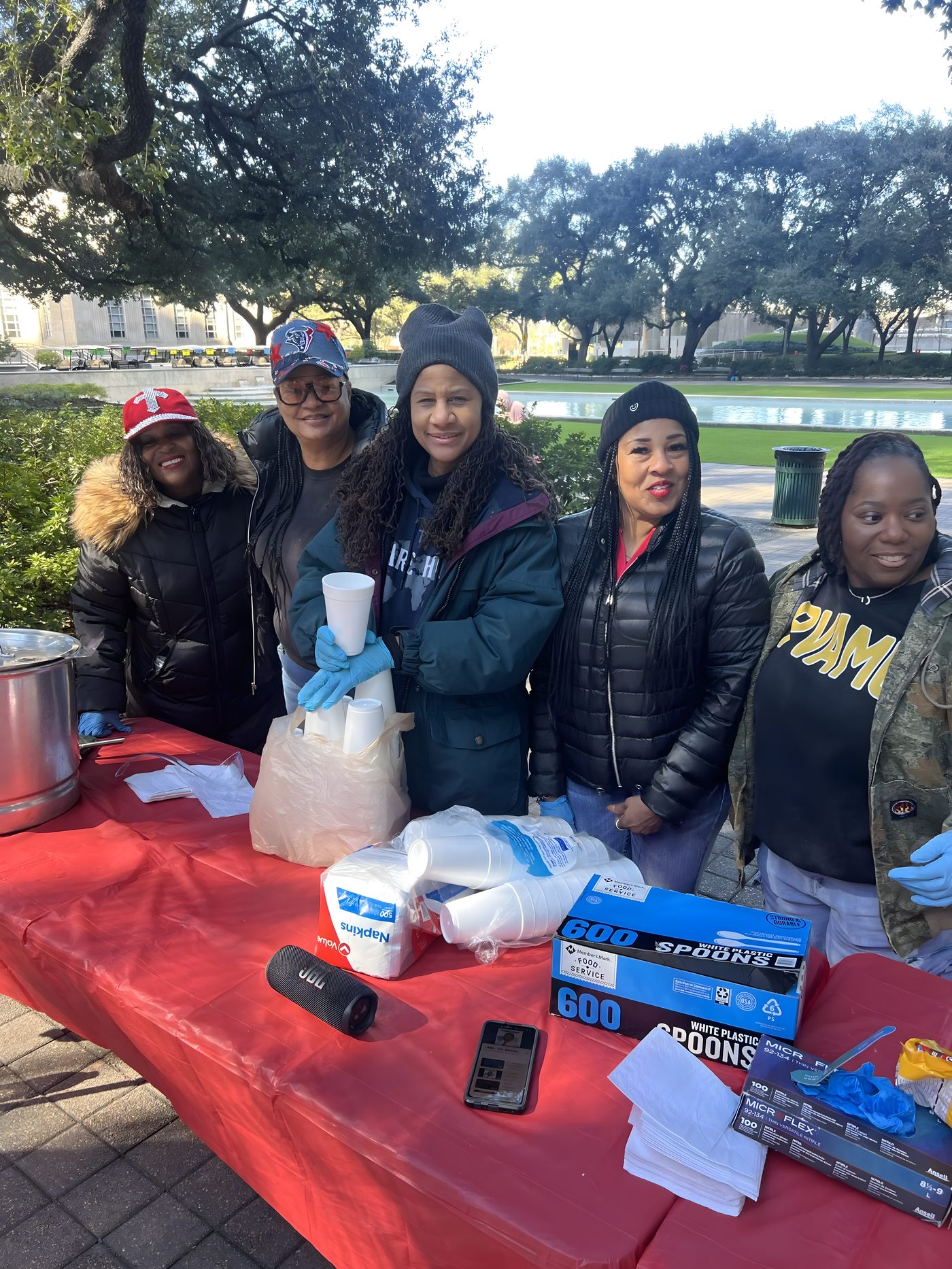 Setting up the food line with City Hall in the background