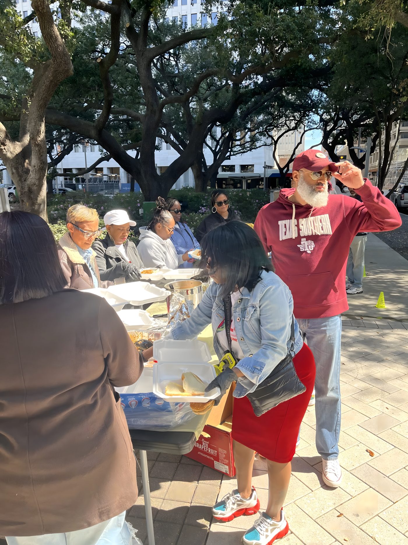 At the serving table near Houston City Hall